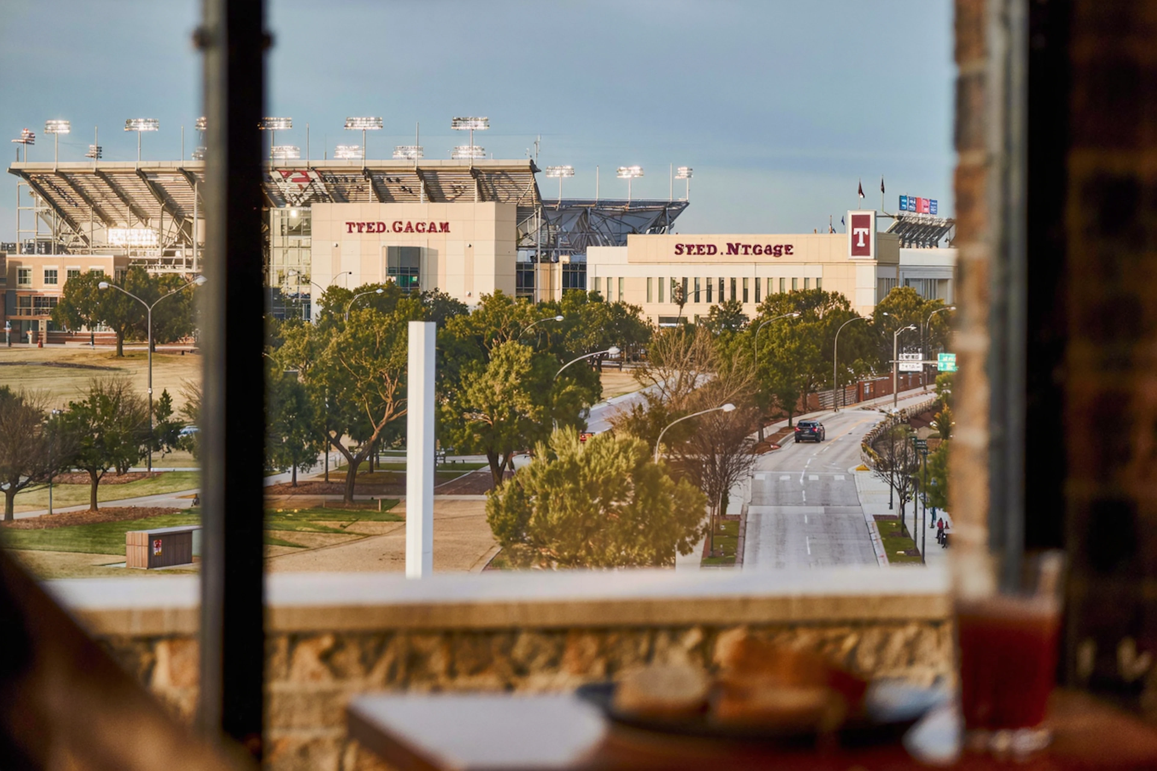 SEO refresh of an already-published article. Google currently shows it around position 8 for these real searches: "messi at kyle field" (27 impressions, pos 7.6); "messi kyle field" (22 impressions, pos 7.6); "kyle field messi" (11 impressions, pos 7.2); "lionel messi college station" (5 impressions, pos 4.6); "why was messi at kyle field" (3 impressions, pos 10.0). Rewrite to answer those queries directly (work their phrasing into H2s and the FAQ, add a direct-answer paragra