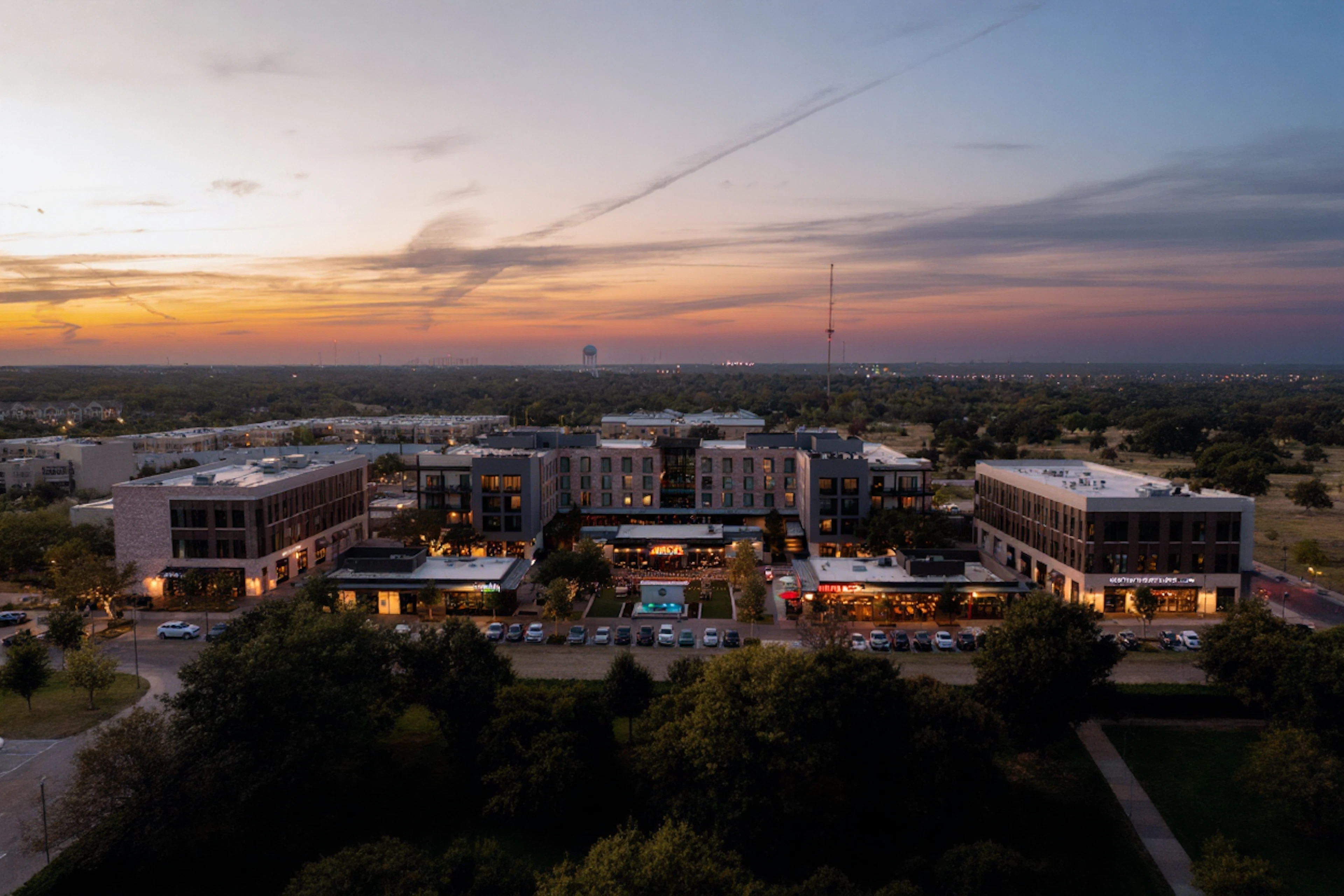 Century Square's outdoor Biergarten returns every weekend this fall on The Green — shaded picnic tables, brews from surrounding bars, to-go food, road-game watch parties on a 16' LED TV, and a free game-day shuttle to and from Kyle Field.