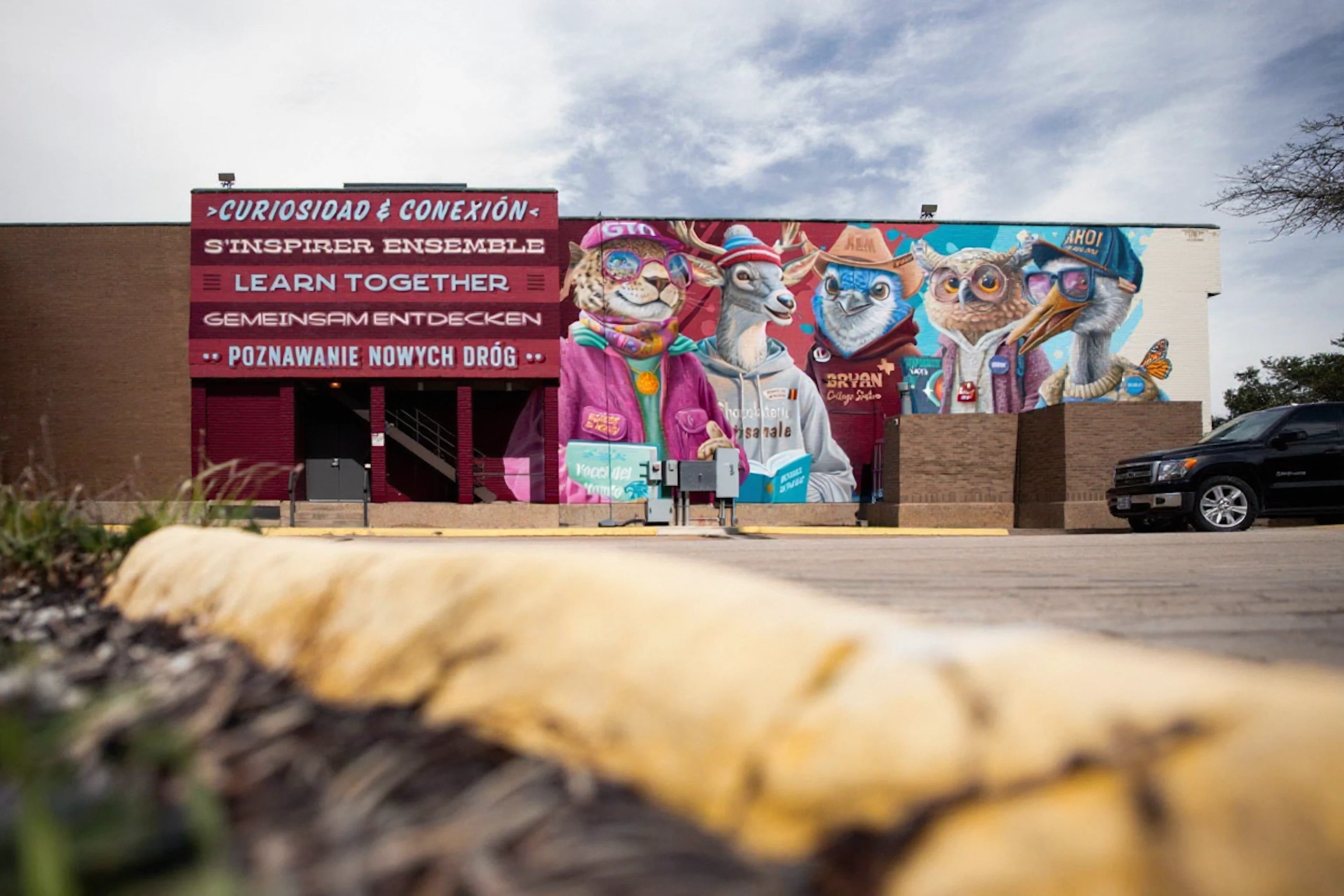 A new mural celebrating global friendships has been unveiled at Clara B. Mounce Public Library in Downtown Bryan – a beautiful addition to the local art scene.