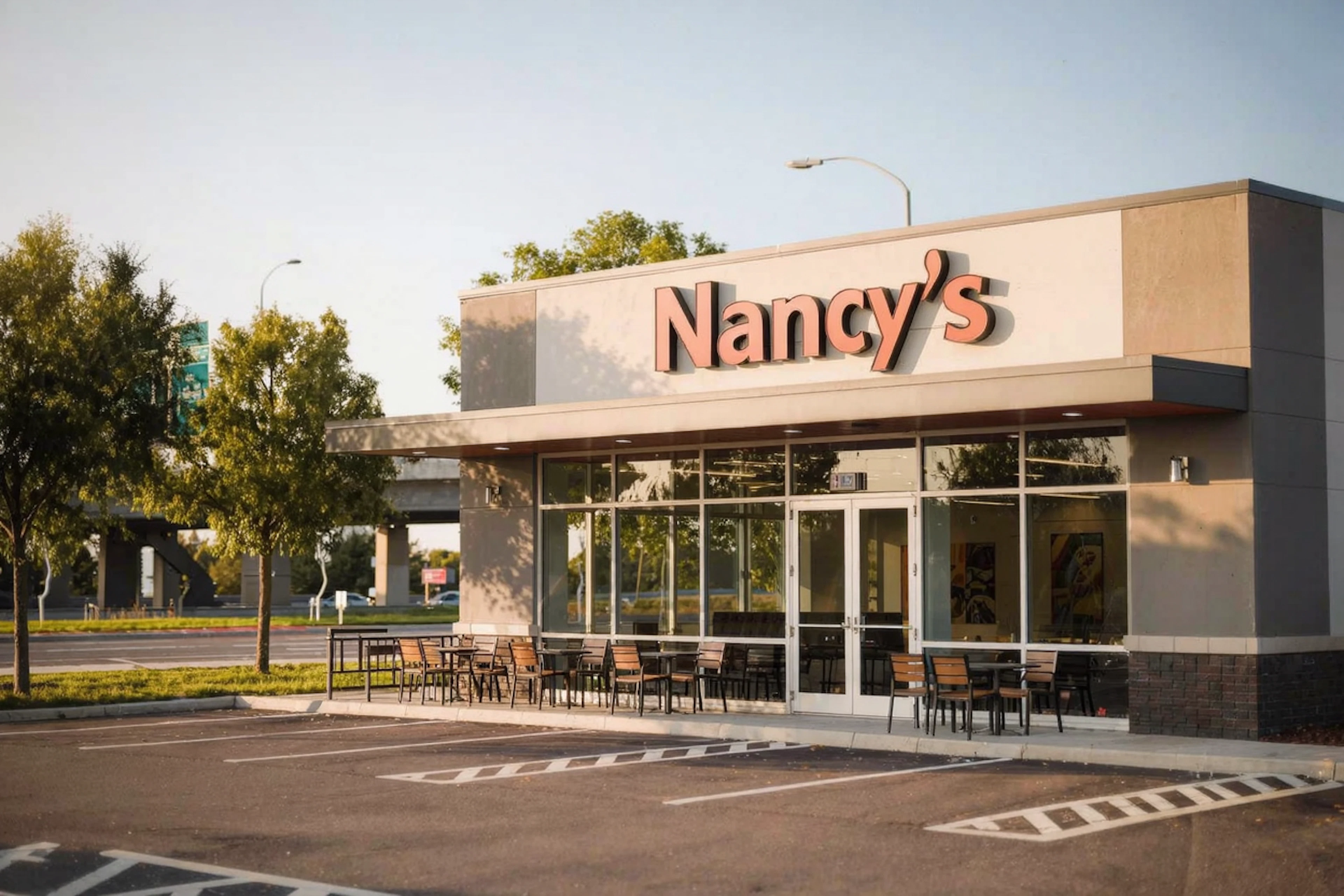 Lunch or dinner within a half-mile of home: Nancy's Deli, the walkable deli the community already lists as a nearby dining option.