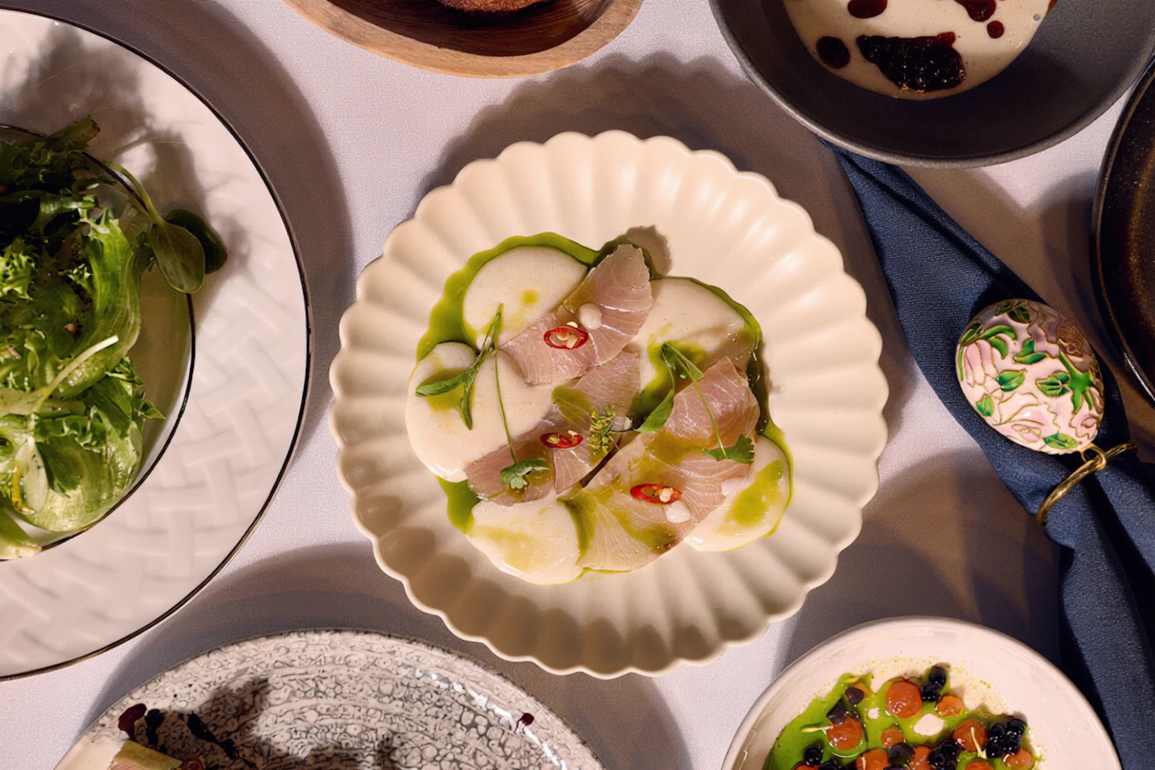 Jantra, an intimate eight-seat tasting menu restaurant from James Beard Award-winning chef Benchawan Jabthong Painter, offers a unique culinary experience in Houston.